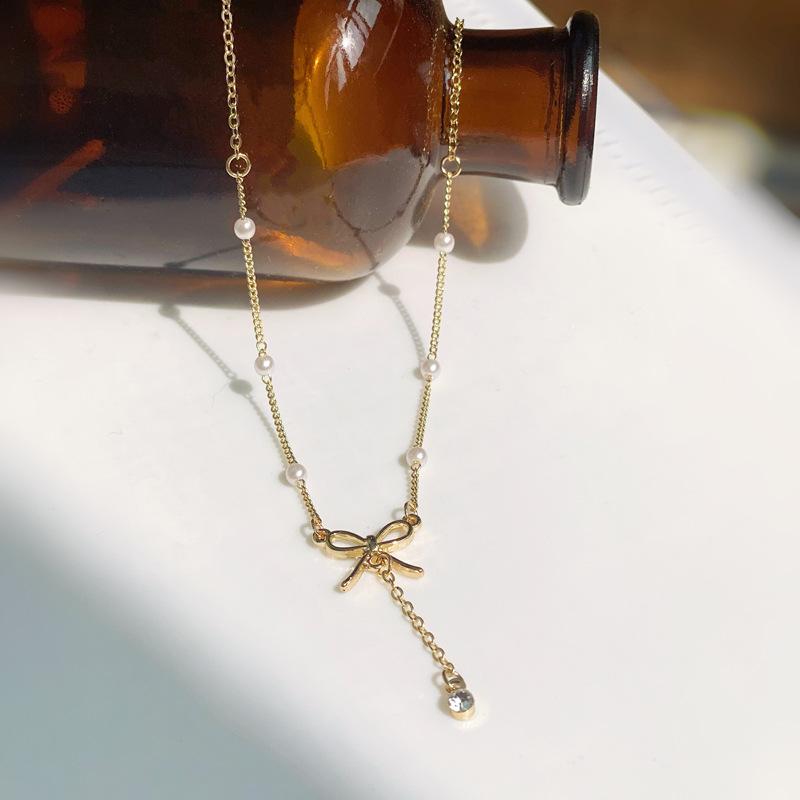 日韓風珍珠蝴蝶結項鍊時尚甜美金屬質感項飾