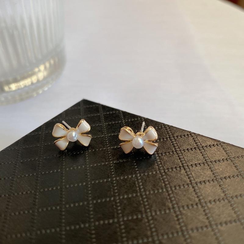 S925銀針日韓風優雅珍珠蝴蝶結時尚氣質小巧耳釘